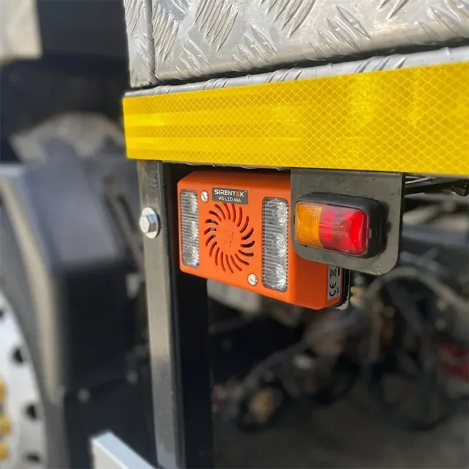 Reversing alarm fitted to a commercial work vehicle in Australia